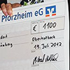 1100 Euro - Spendenscheck